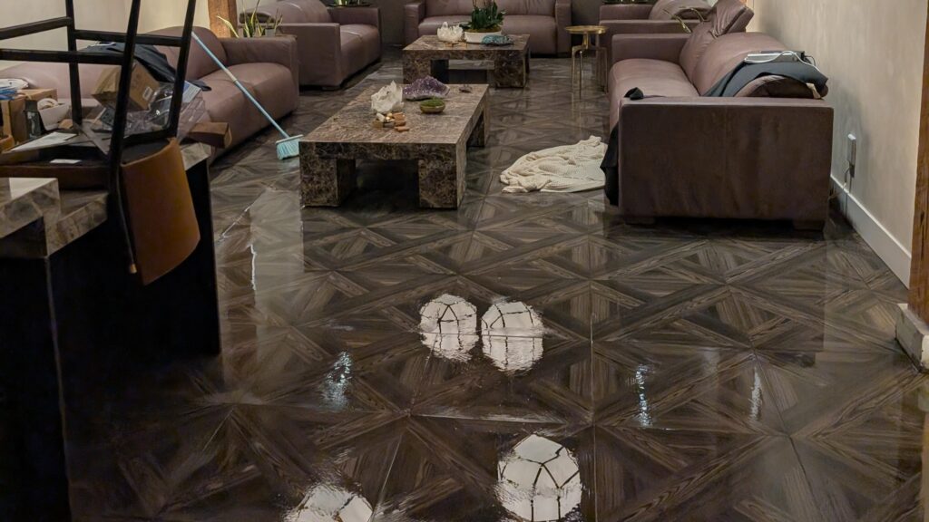 standing water on wellness tile floor after indoor flooding