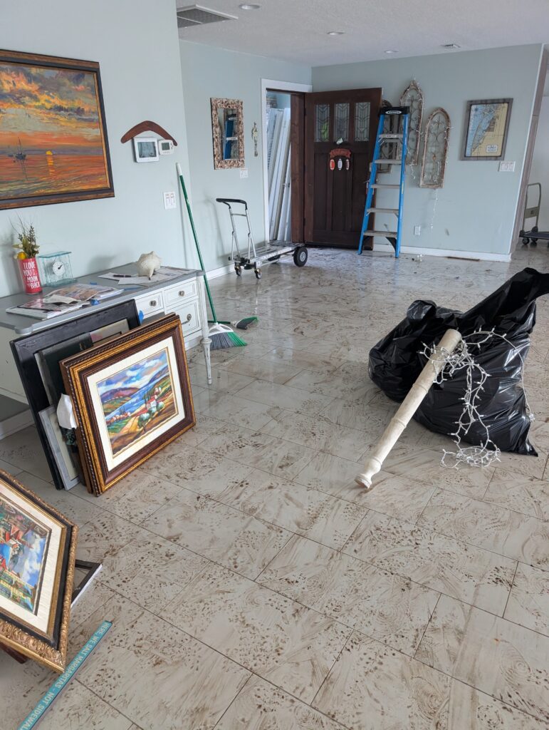 living room floor after residential water damage