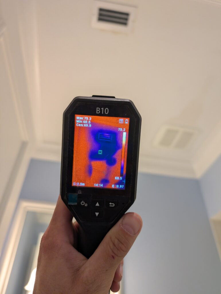 Thermal imaging camera detecting moisture in ceiling from water damage in Palm Beach County