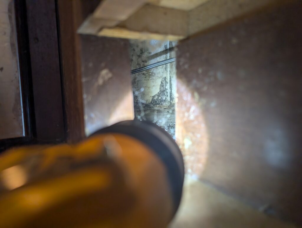Hidden mold growth inside wall cavity detected during inspection in Palm Beach County home