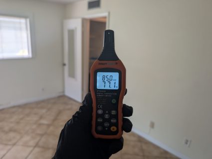 Moisture meter reading in Palm Beach County home during water damage inspection