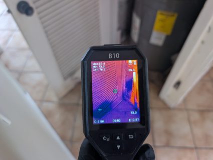 Thermal imaging detecting moisture near HVAC closet from water damage in Palm Beach County home